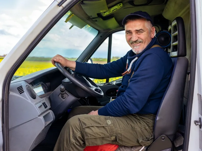 Mobile technician performing windshield replacement